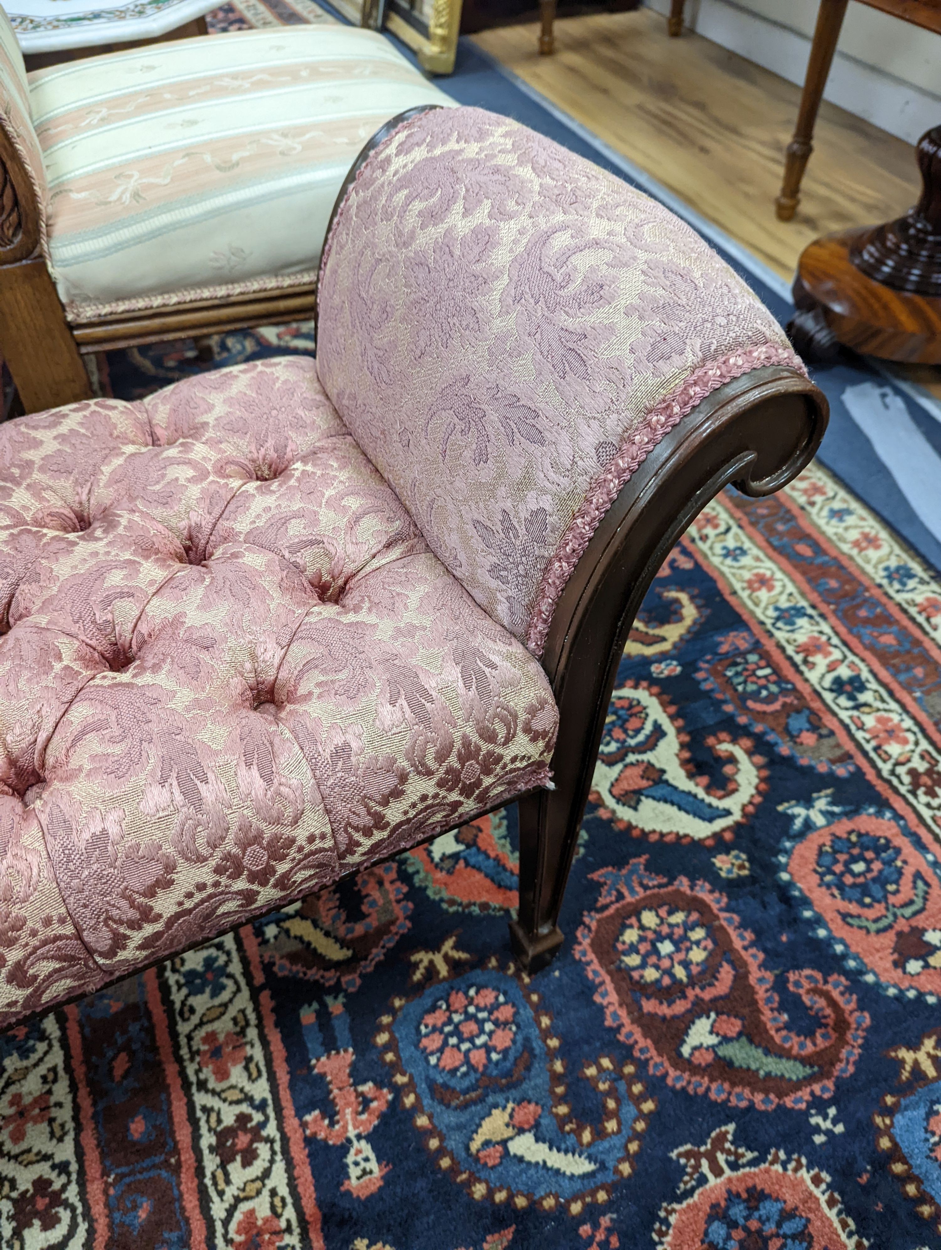 An Edwardian mahogany window seat, with deep buttoned upholstered seat, length 114cm, depth 38cm, height 57cm